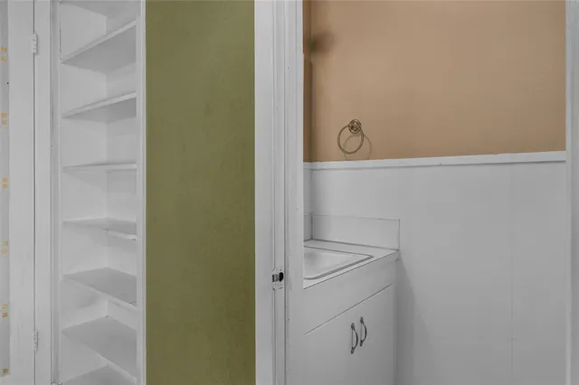 a bathroom with a shower and vanity