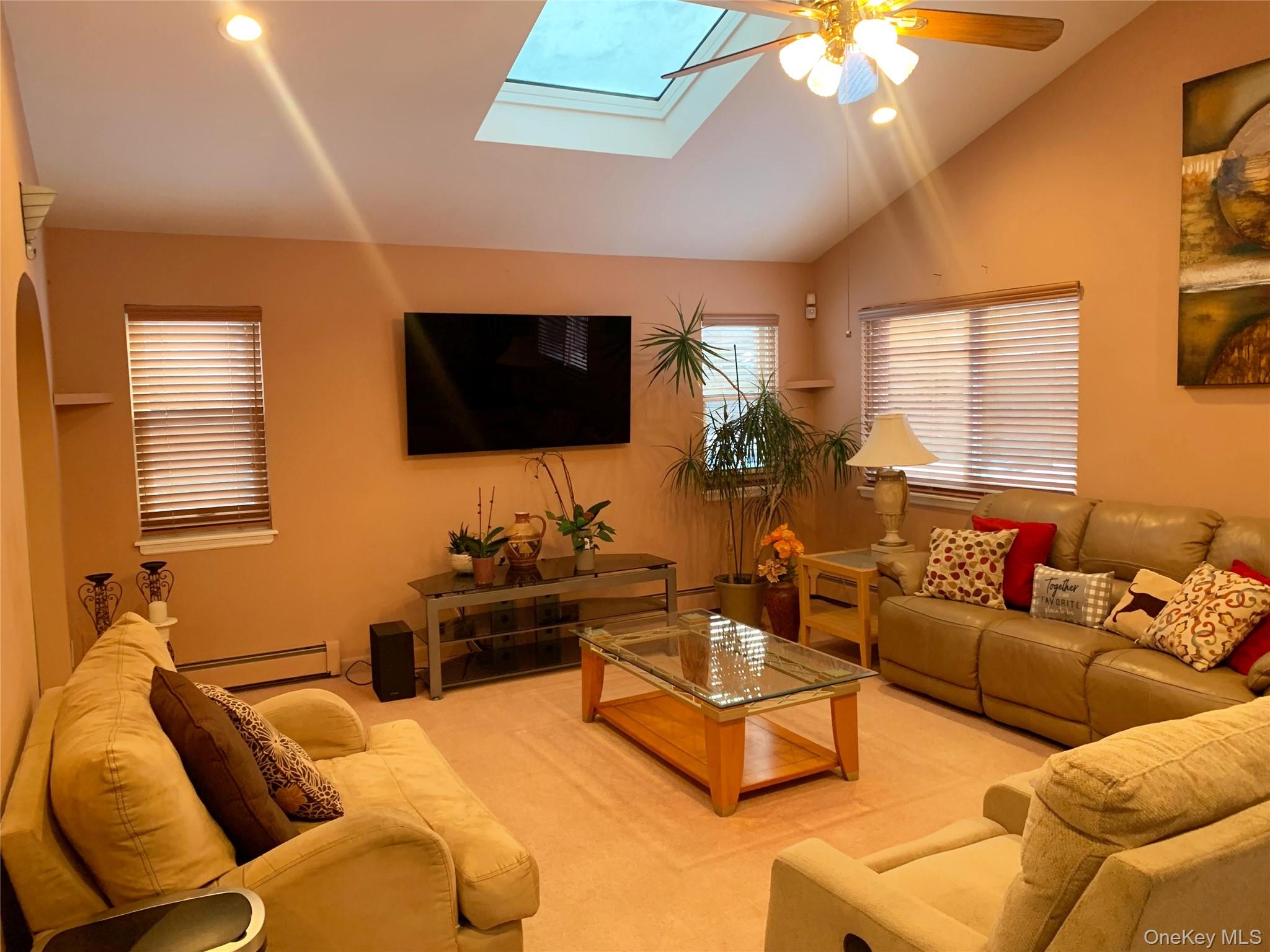 8 Autumn Lane Stony Point, NY 10980 - Photo 11 of 40 a living room with furniture and a flat screen tv