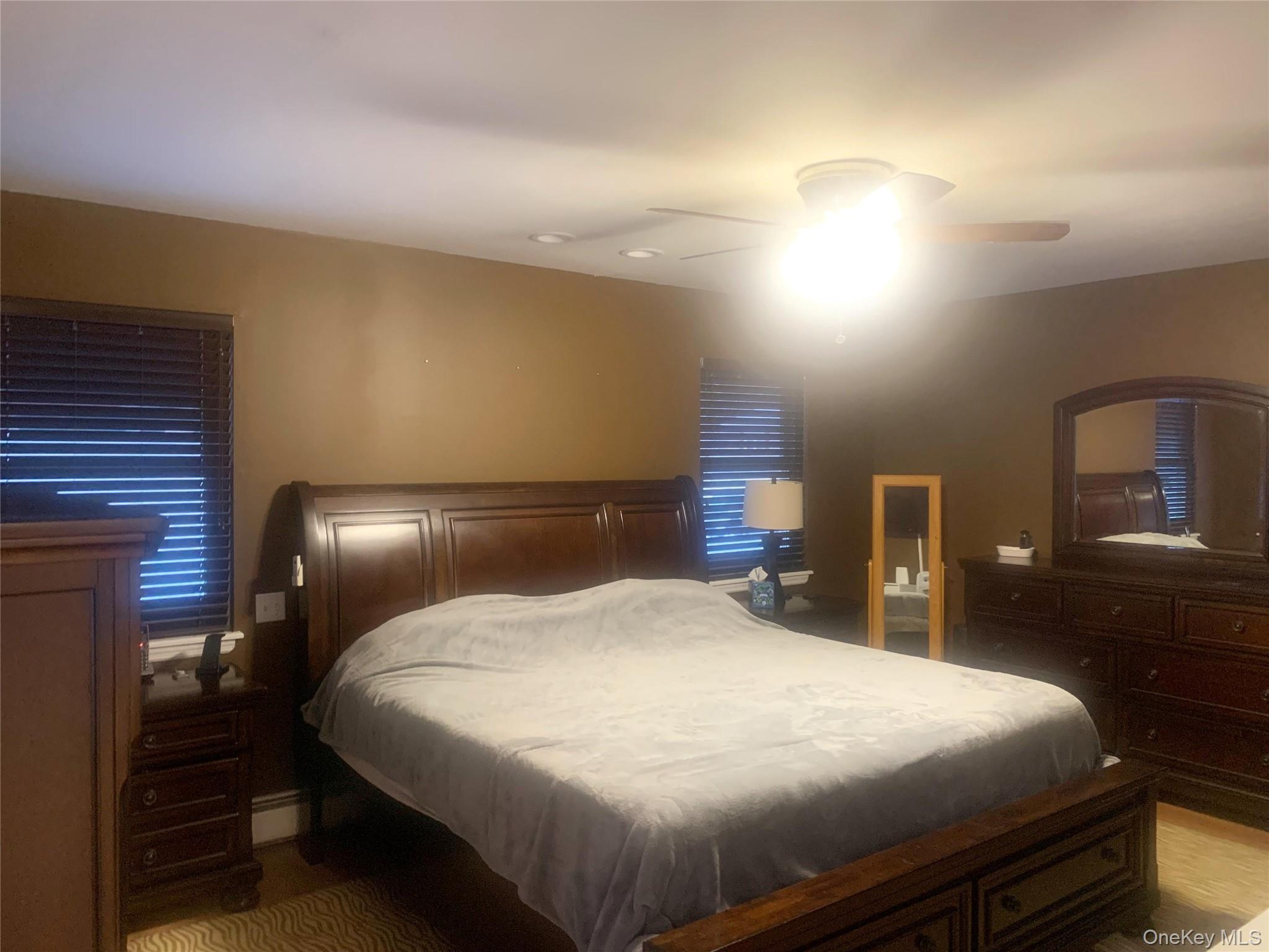 8 Autumn Lane Stony Point, NY 10980 - Photo 29 of 40 a large bed sitting in a bedroom next to a lamp