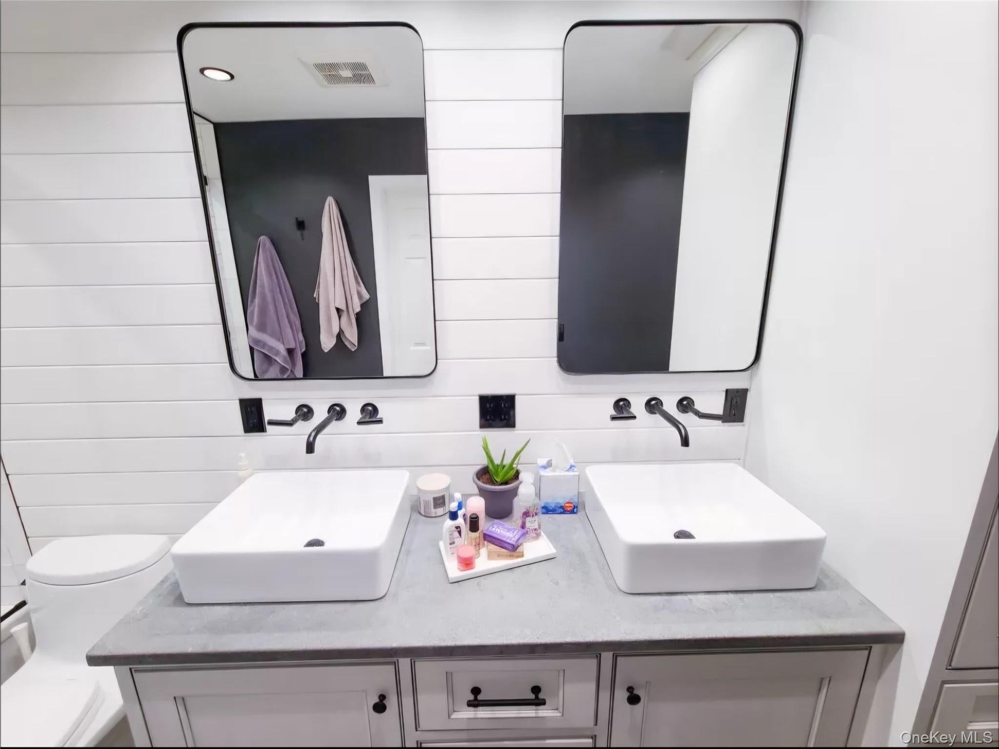 8 Autumn Lane Stony Point, NY 10980 - Photo 32 of 40 a bathroom with a sink and a mirror