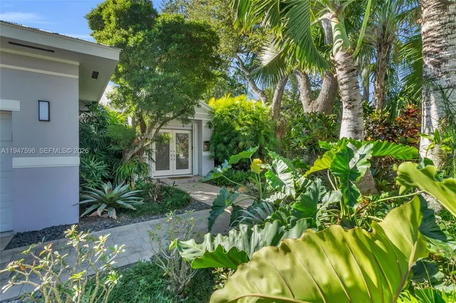 a plant is in front of a house