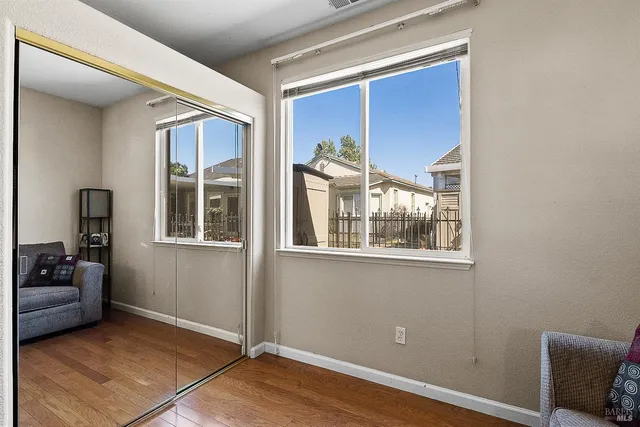 a view of livingroom with furniture and windows
