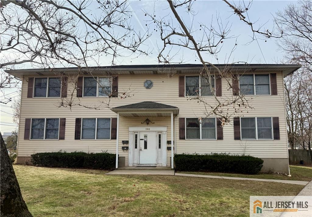285 South Lincoln Avenue Middlesex, NJ 08846 - Photo 1 of 11 a front view of a house with a yard