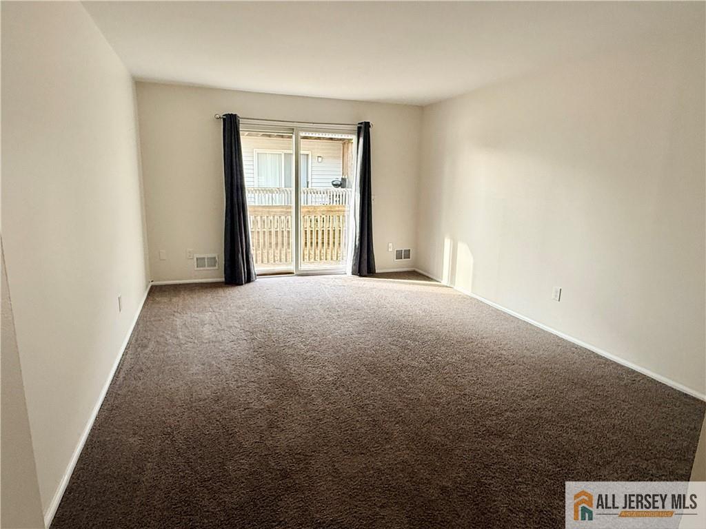 285 South Lincoln Avenue Middlesex, NJ 08846 - Photo 2 of 11 a view of an empty room with a window