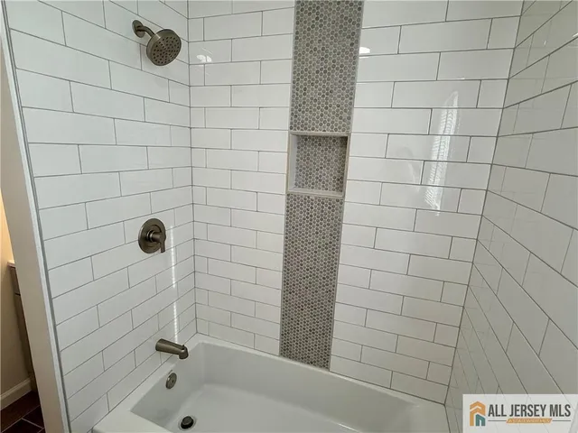 a bathroom with a bathtub