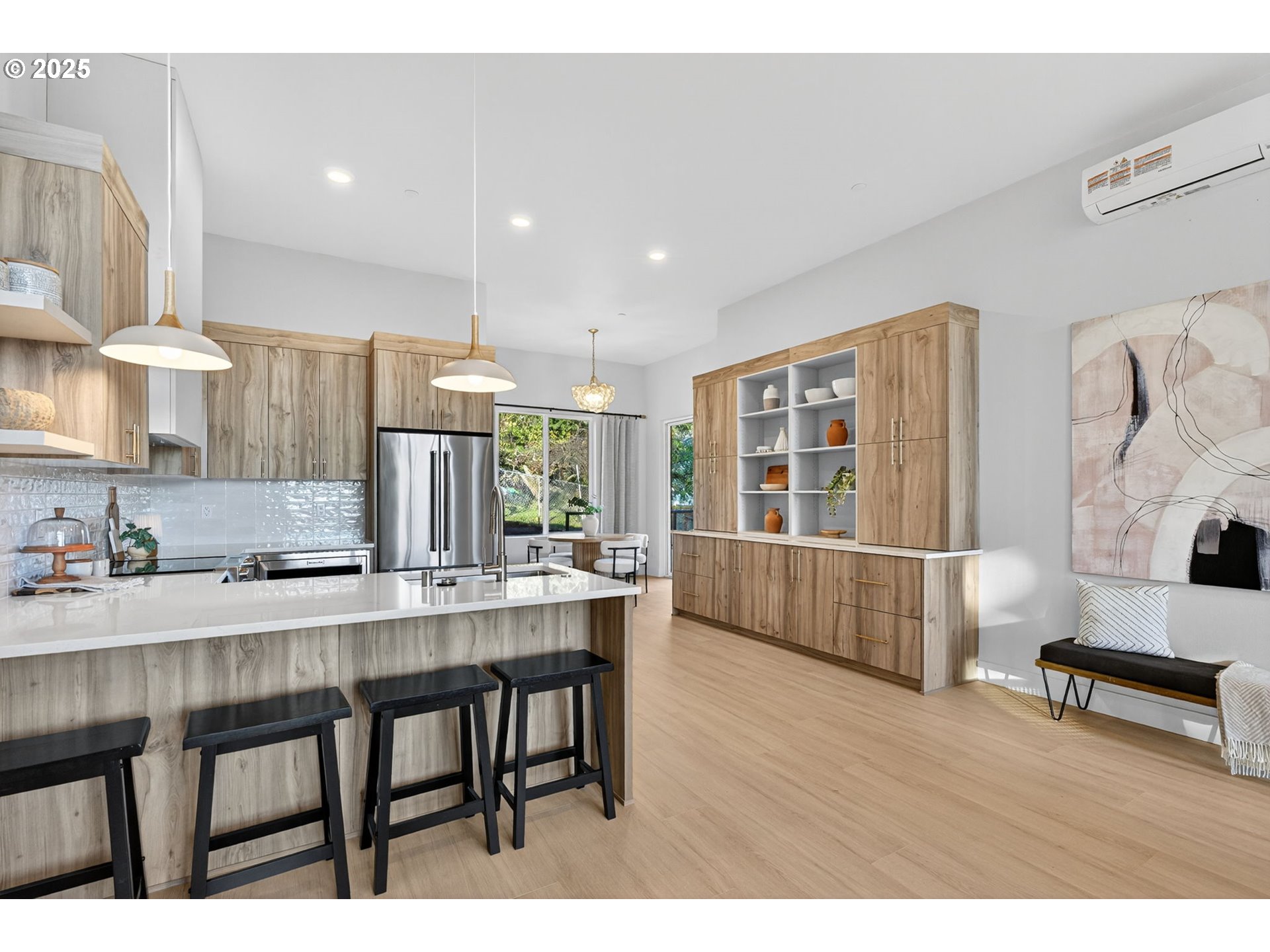 1501 Northwest 8th Avenue Camas, WA 98607 - Photo 11 of 47 a open kitchen with granite countertop a stove and white cabinets