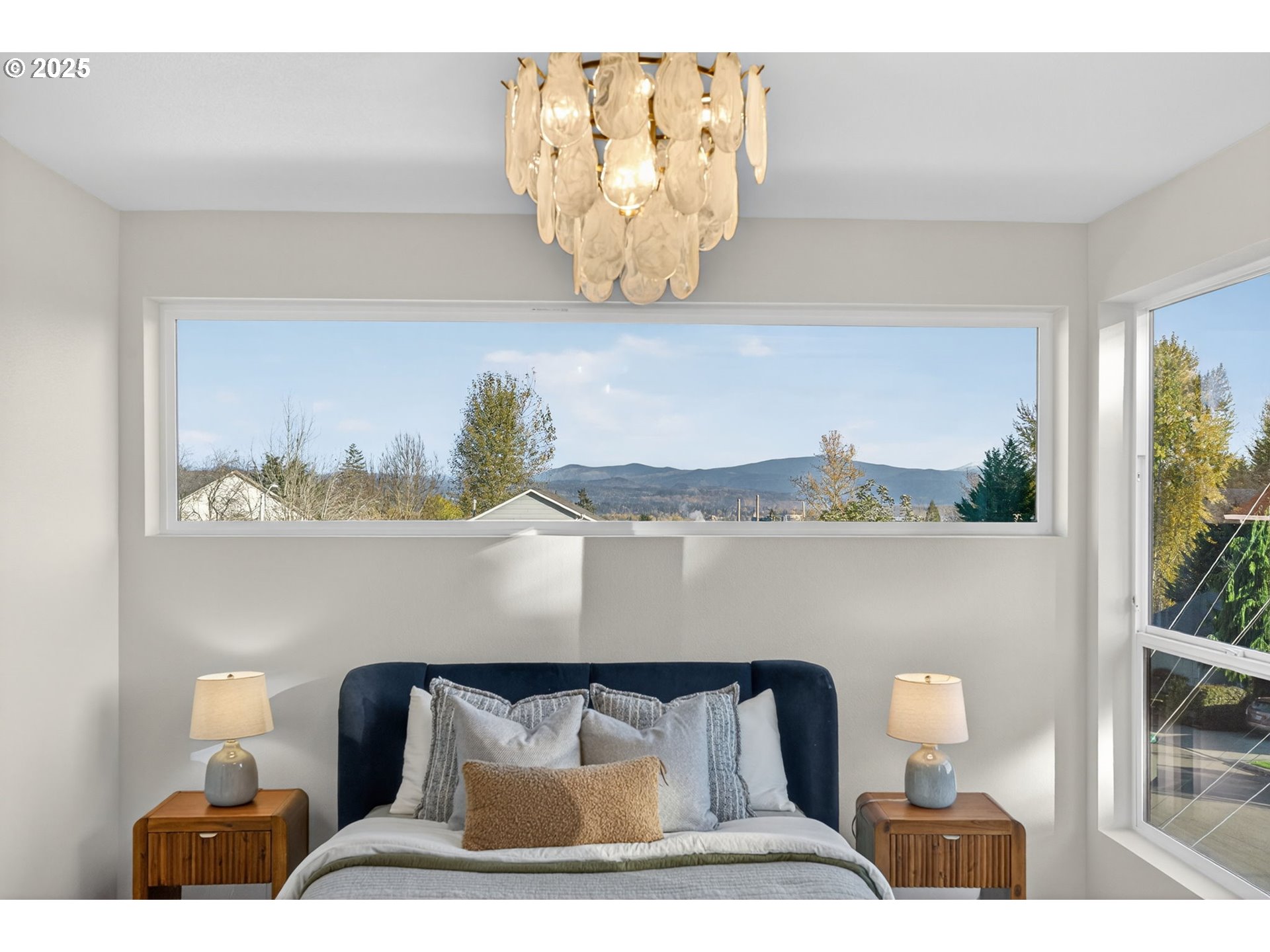 1501 Northwest 8th Avenue Camas, WA 98607 - Photo 23 of 47 a room with a lamp and a potted plant