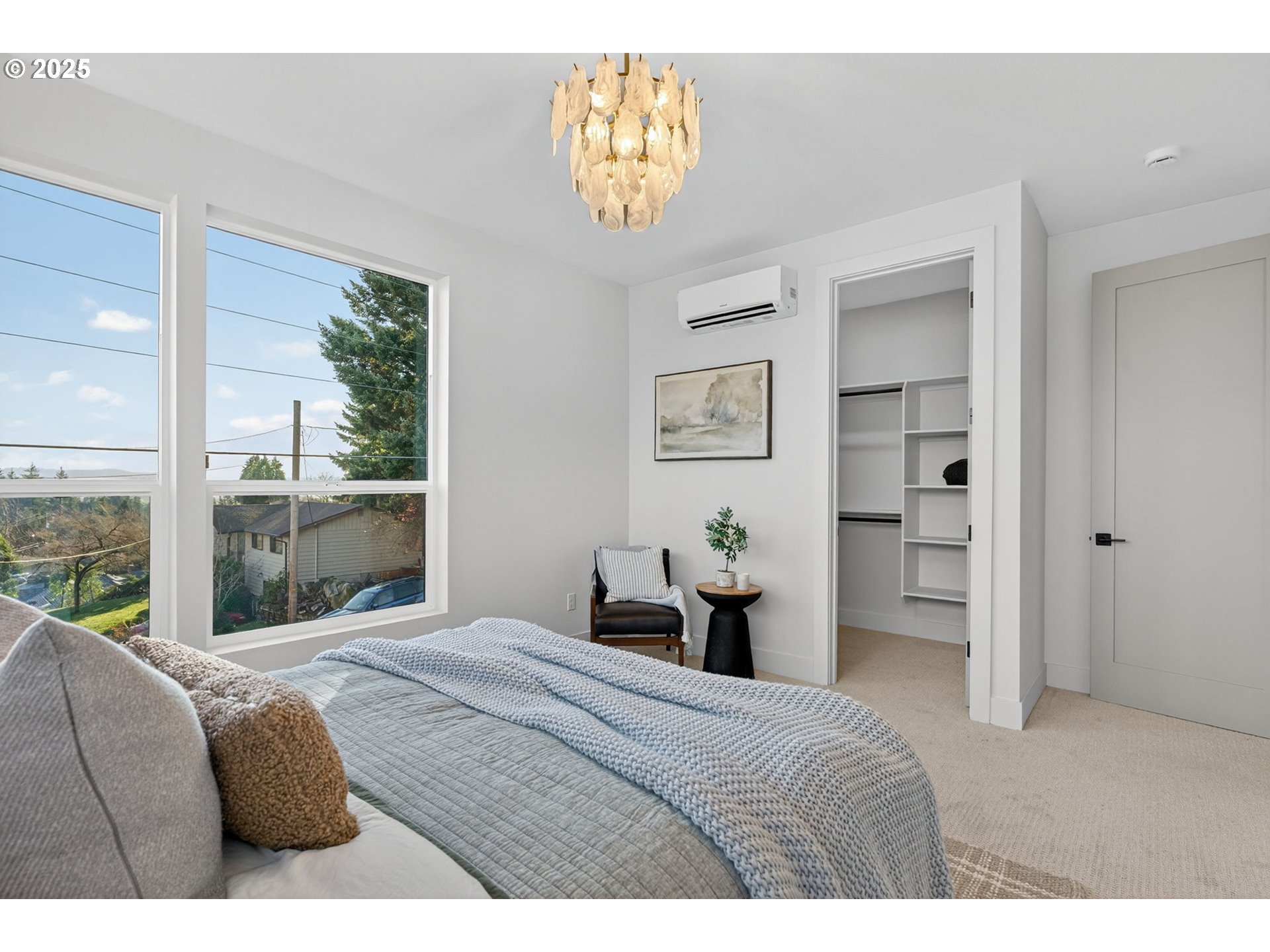 1501 Northwest 8th Avenue Camas, WA 98607 - Photo 24 of 47 a bedroom with a bed and a large window