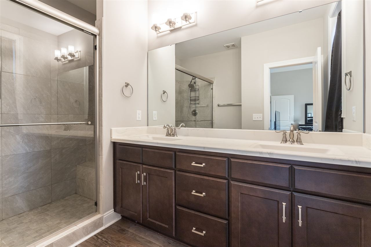 3318 High Gate Road Raleigh, NC 27603 - Photo 7 of 16 Double vanity and storage space in master bath! Master Bath/Spa