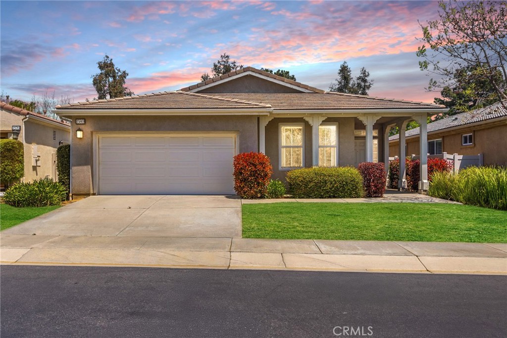 1580 Turtle Creek Beaumont, CA 92223 - Photo 1 of 39 a front view of a house with a garden
