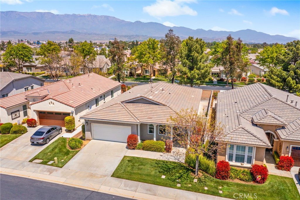 1580 Turtle Creek Beaumont, CA 92223 - Photo 29 of 39 an aerial view of residential houses with a lush green forest