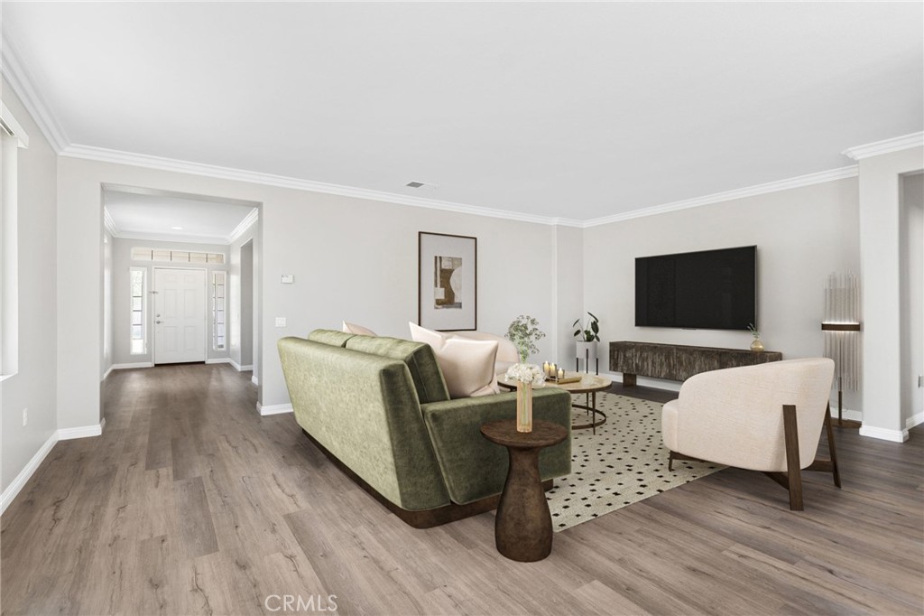 1580 Turtle Creek Beaumont, CA 92223 - Photo 4 of 39 a living room with furniture and a flat screen tv