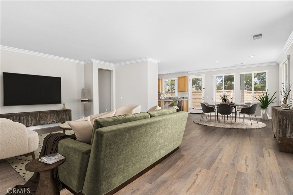 1580 Turtle Creek Beaumont, CA 92223 - Photo 5 of 39 a living room with furniture and a flat screen tv