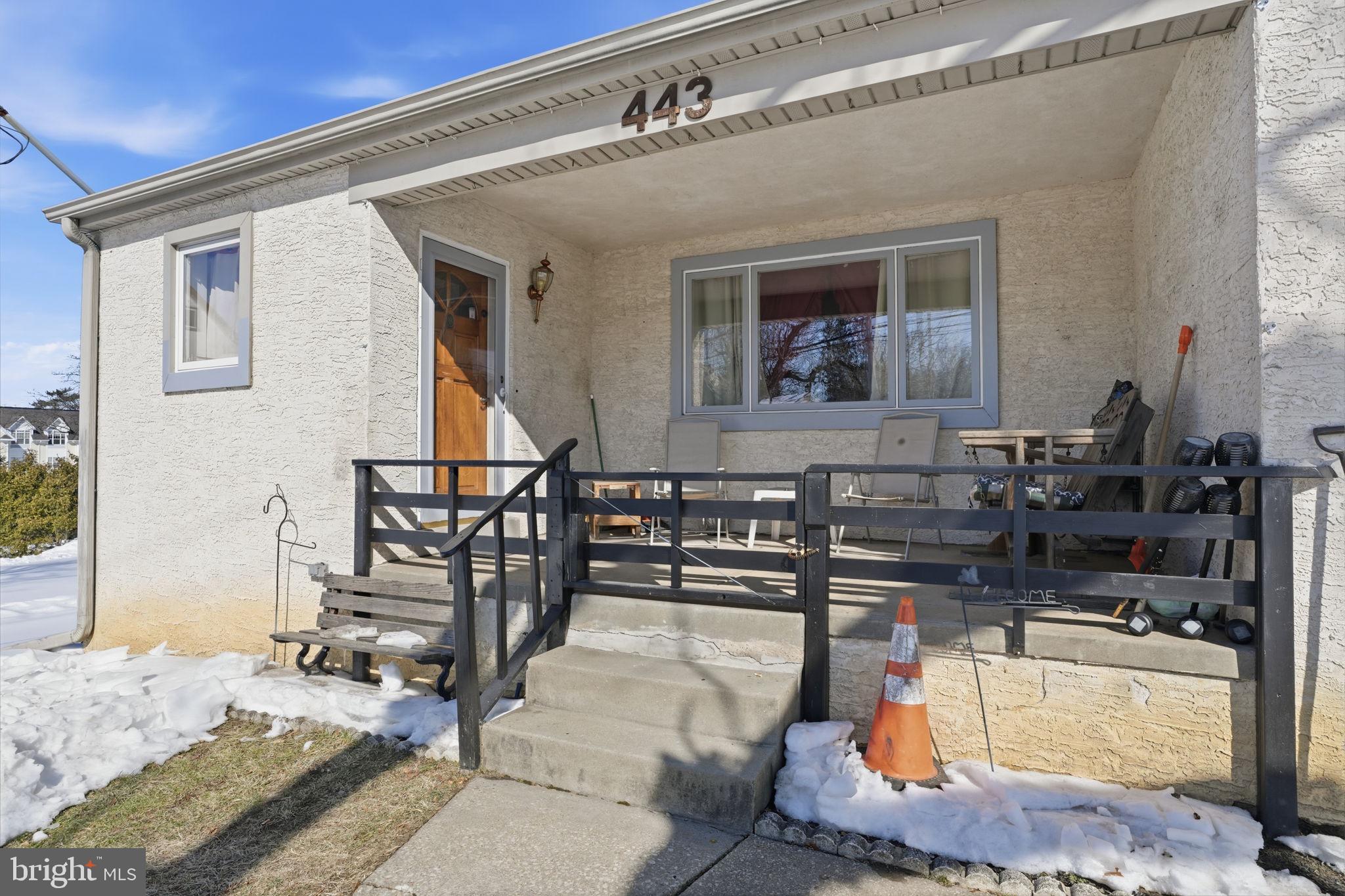 443 Ridge Pike Lafayette Hill, PA 19444 - Photo 2 of 13 a view of a living room and workspace