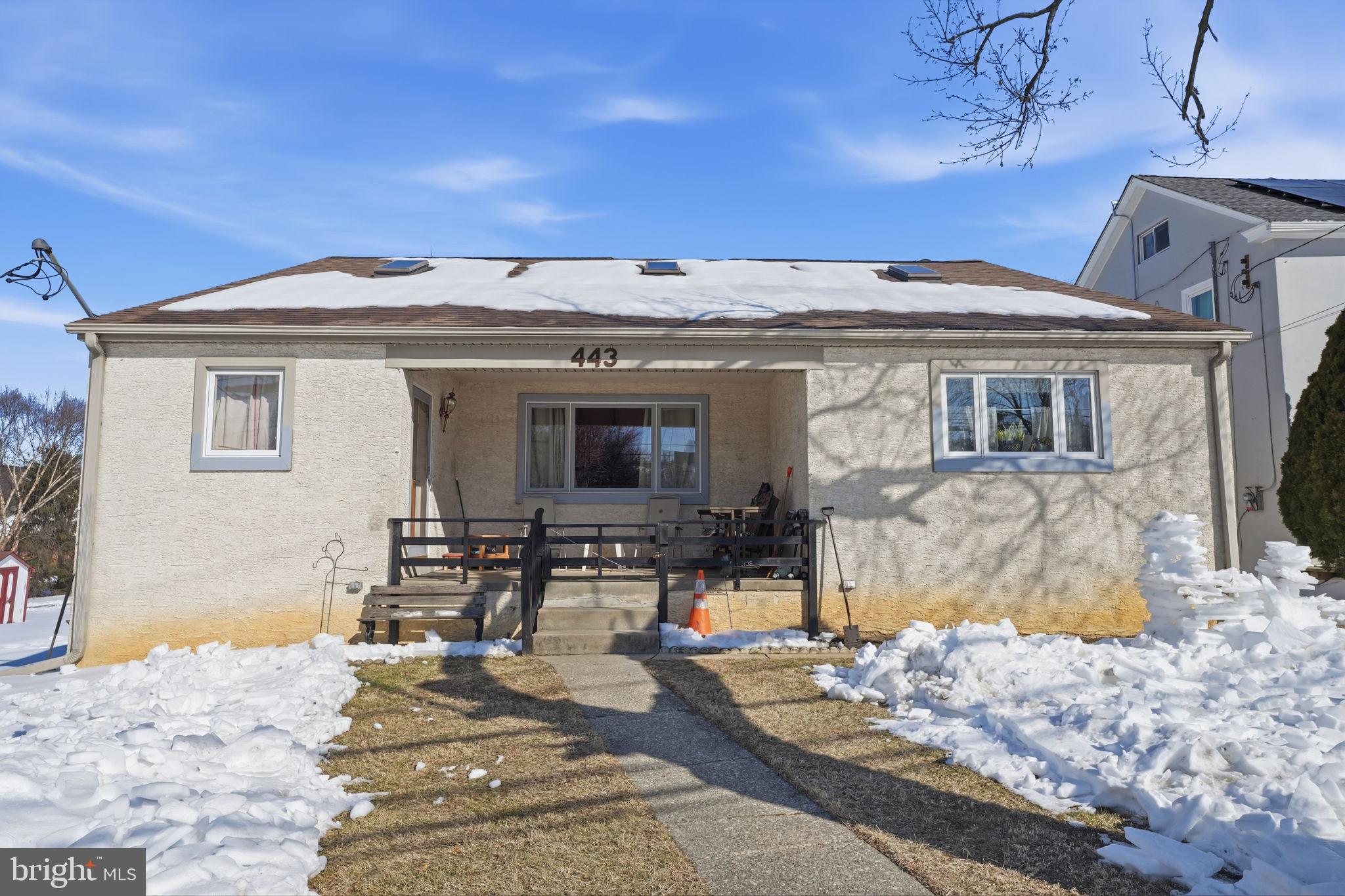 443 Ridge Pike Lafayette Hill, PA 19444 - Photo 3 of 13 a view of a house with wooden walls