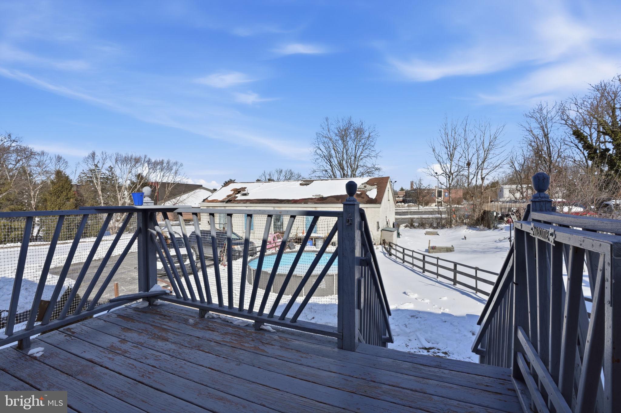 443 Ridge Pike Lafayette Hill, PA 19444 - Photo 8 of 13 a view of balcony with wooden floor and fence