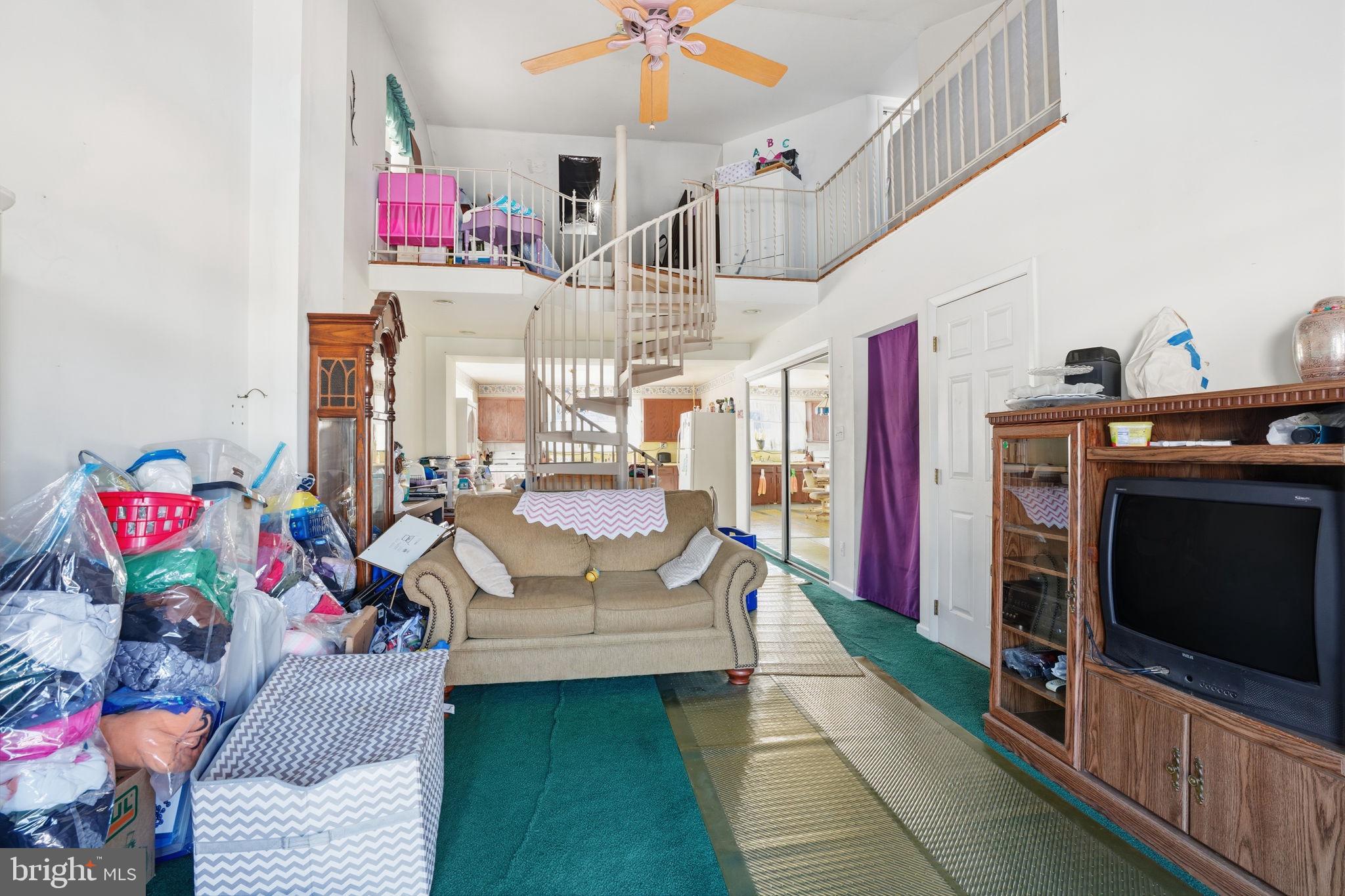 443 Ridge Pike Lafayette Hill, PA 19444 - Photo 10 of 13 a living room with furniture and a fireplace