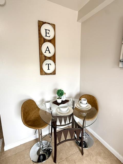 135 Bepler Street Daly City, CA 94014 - Photo 17 of 34 a dining room with furniture and rug