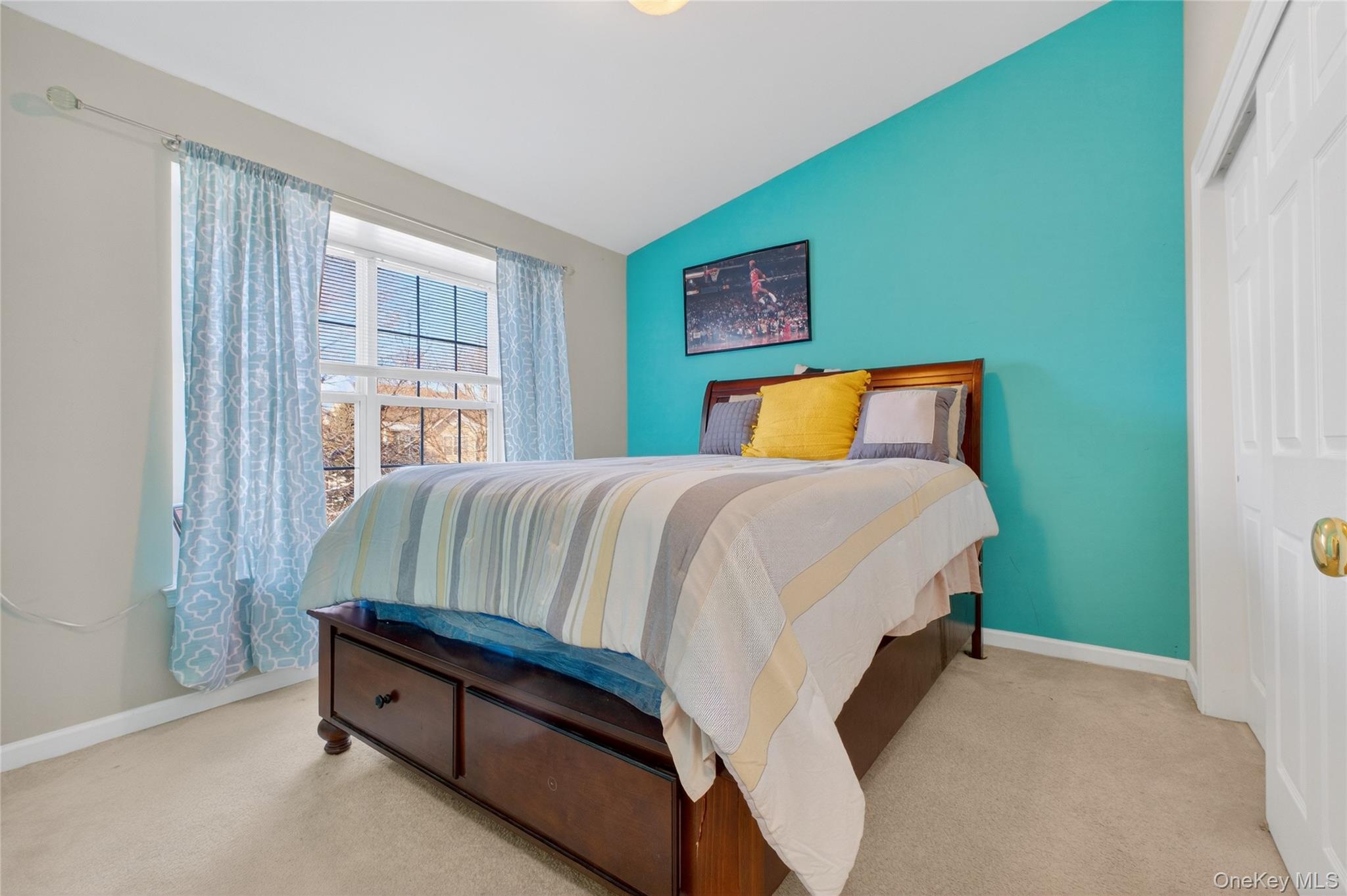 733 Huntington Drive Fishkill, NY 12524 - Photo 15 of 18 Second Bedroom with lofted ceiling, carpet, and a closet