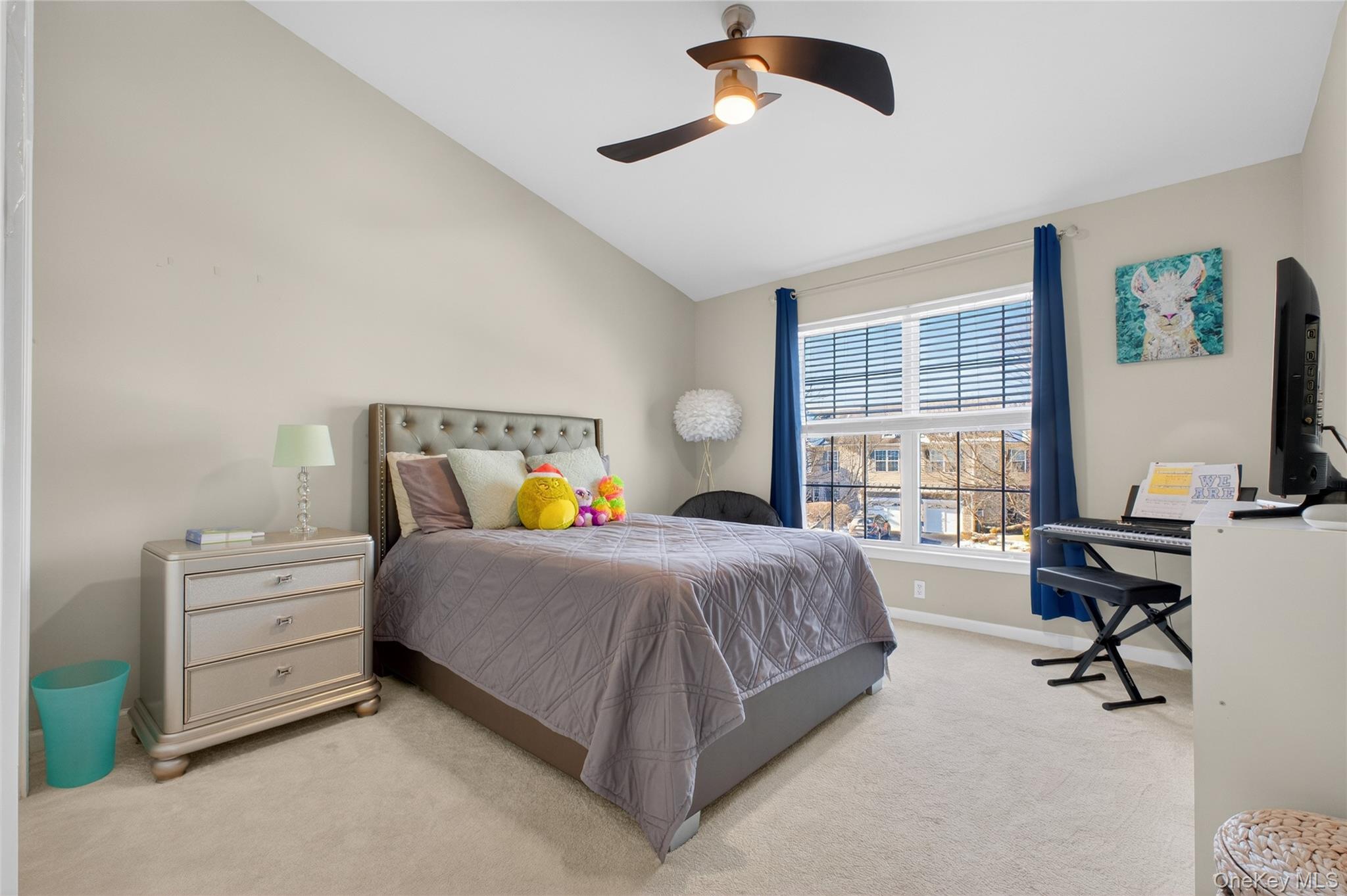 733 Huntington Drive Fishkill, NY 12524 - Photo 16 of 18 Third Bedroom with vaulted ceiling, carpet floors, and ceiling fan