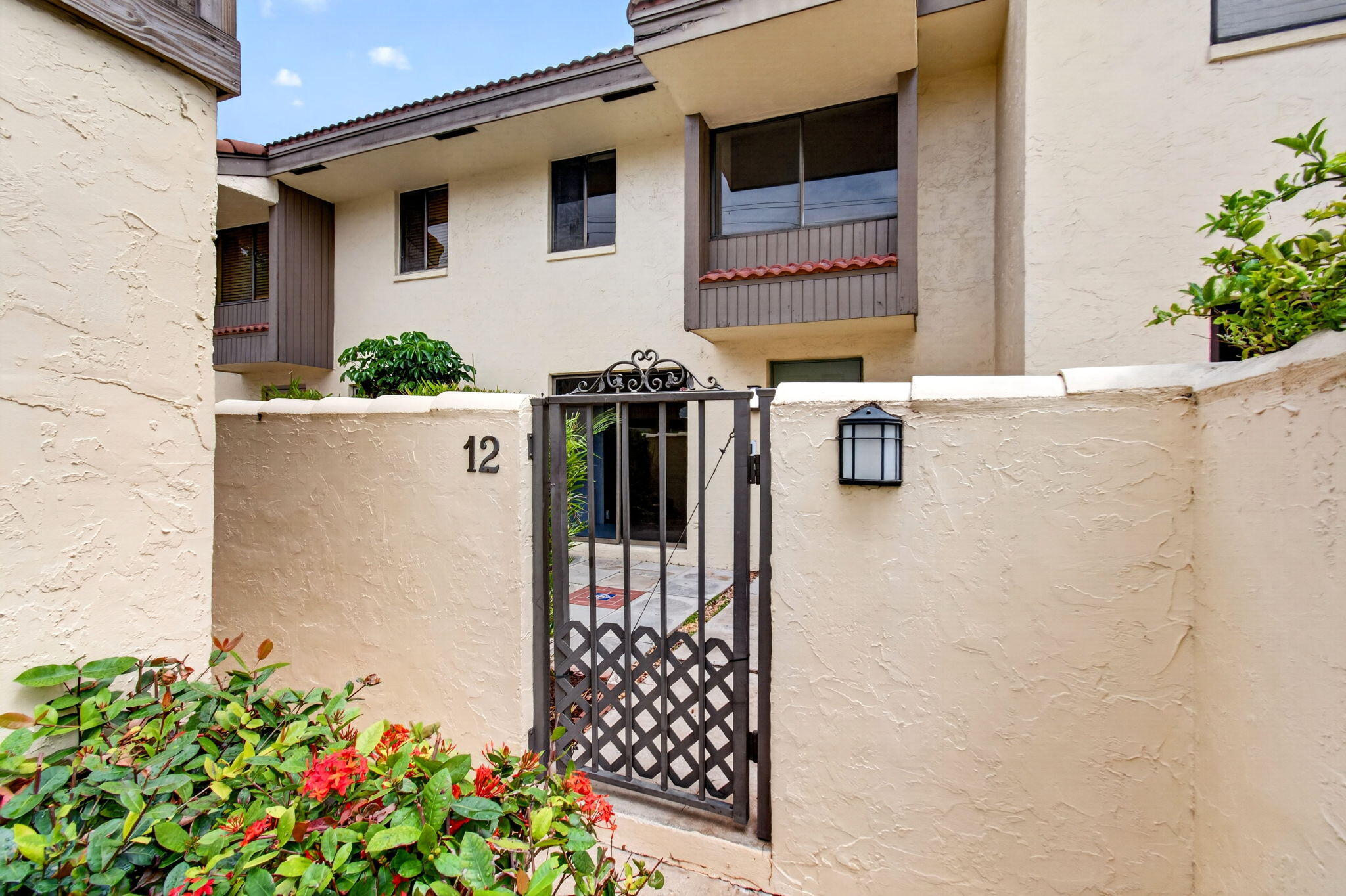 1330 Northwest 13th Street, Unit 12 Boca Raton, FL 33486 - Photo 2 of 52 a view of entryway