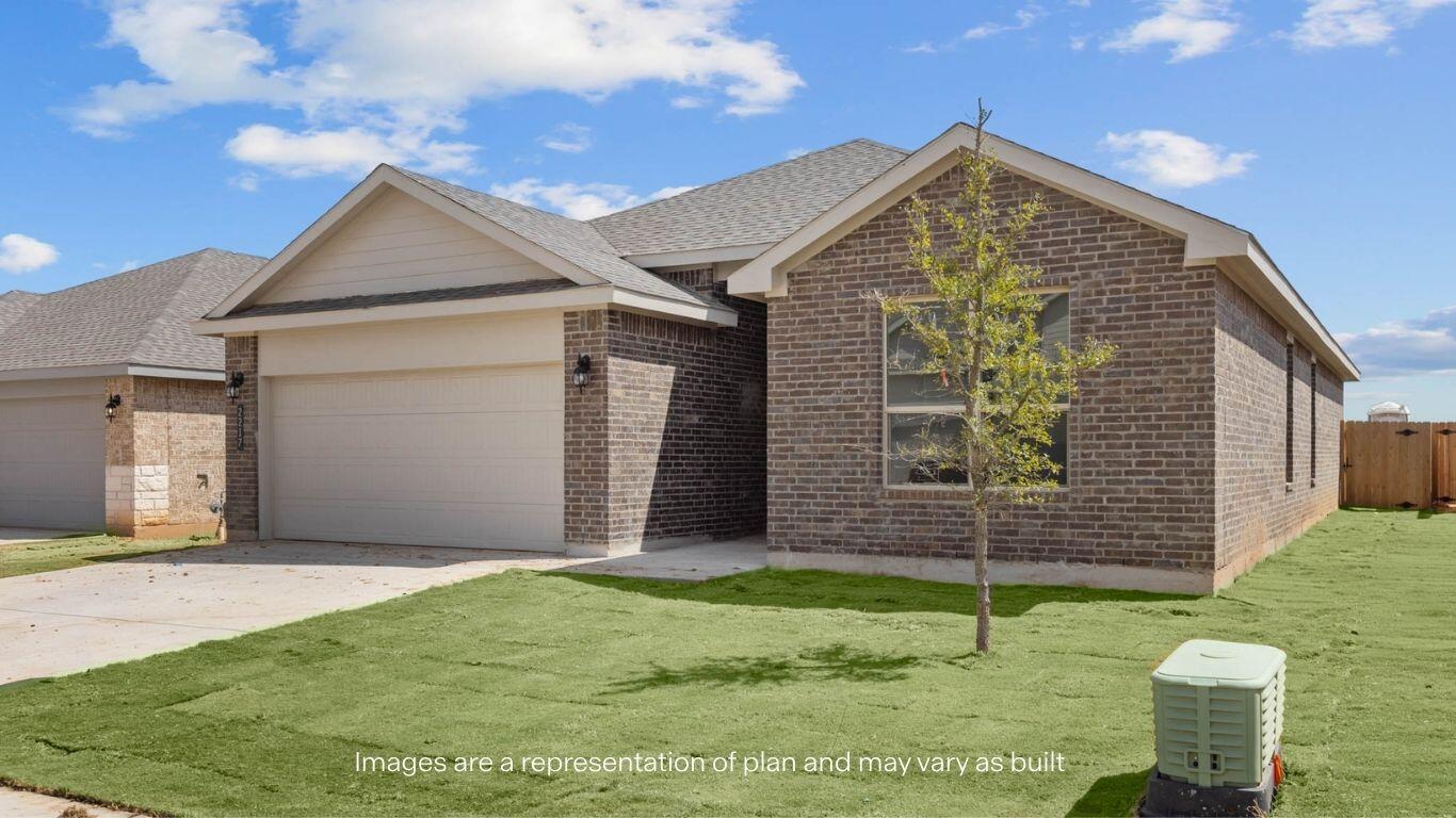 2223 150th Place Lubbock, TX 79423 - Photo 2 of 19 a front view of a house with a garden