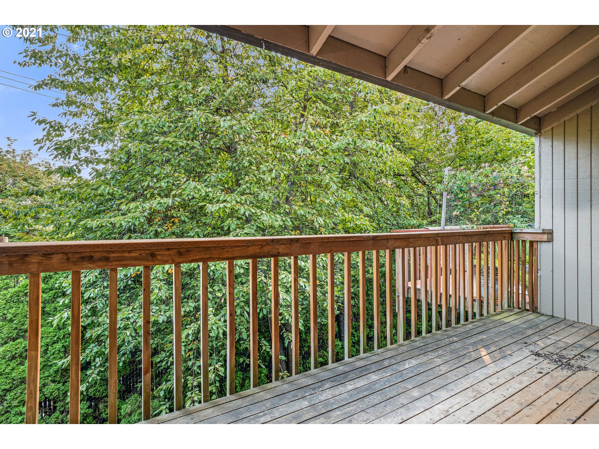 2818 Tree Top Lane West Linn, OR 97068 - Photo 16 of 26 a balcony with wooden floor