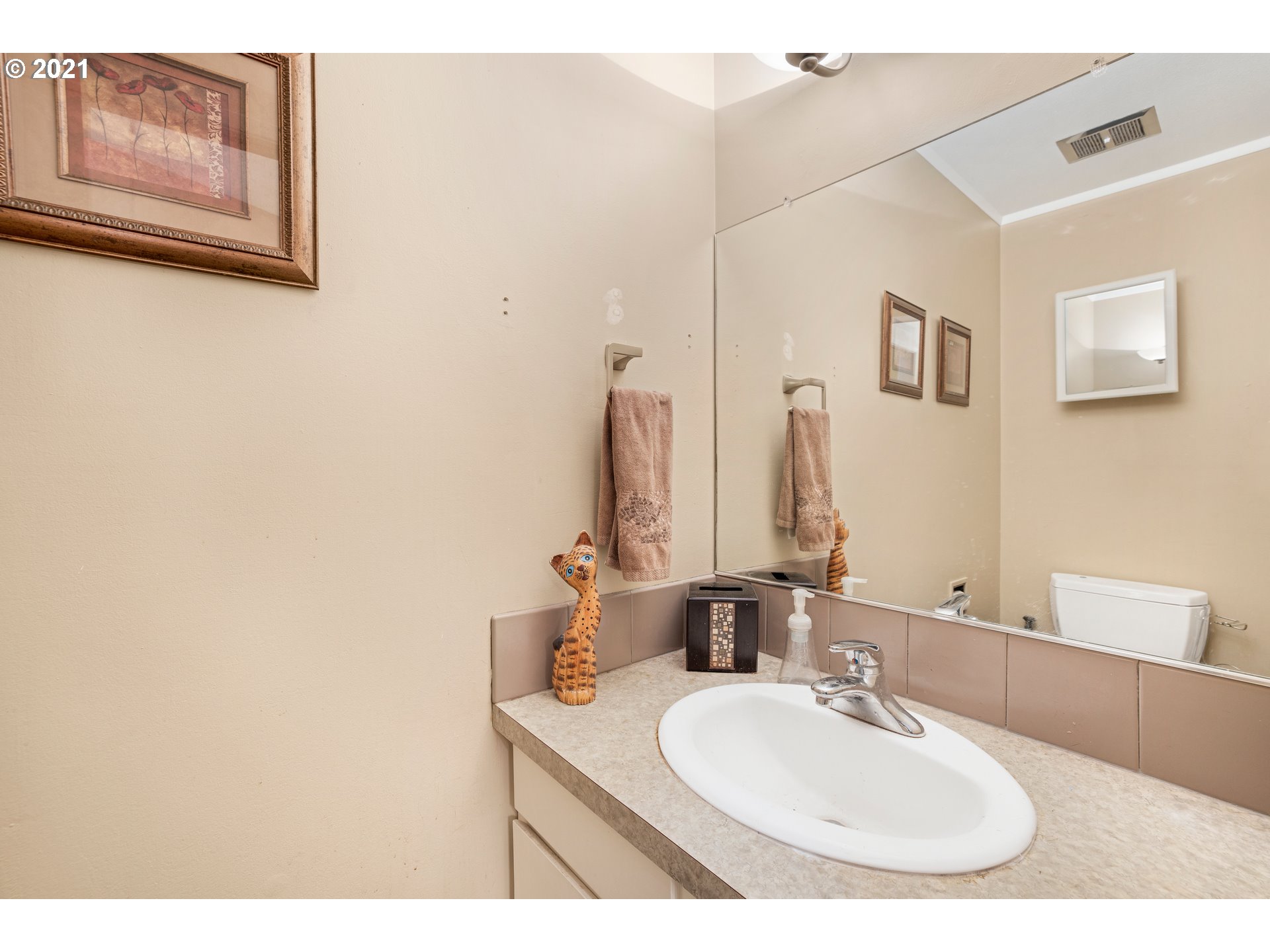 2818 Tree Top Lane West Linn, OR 97068 - Photo 17 of 26 a bathroom with a sink and a mirror