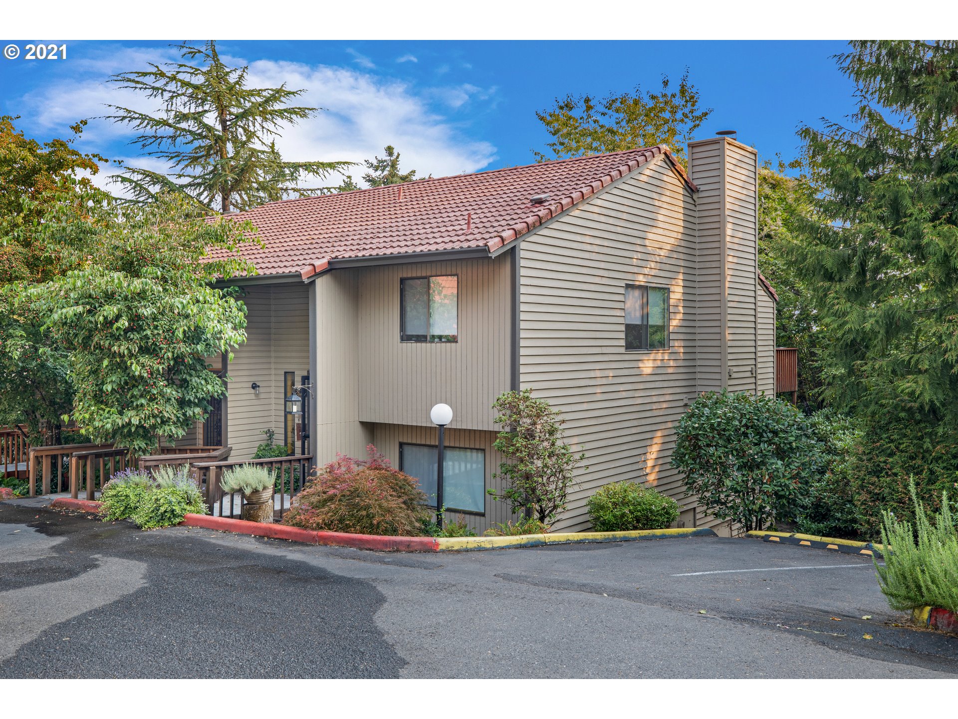 2818 Tree Top Lane West Linn, OR 97068 - Photo 2 of 26 a house view with a garden space