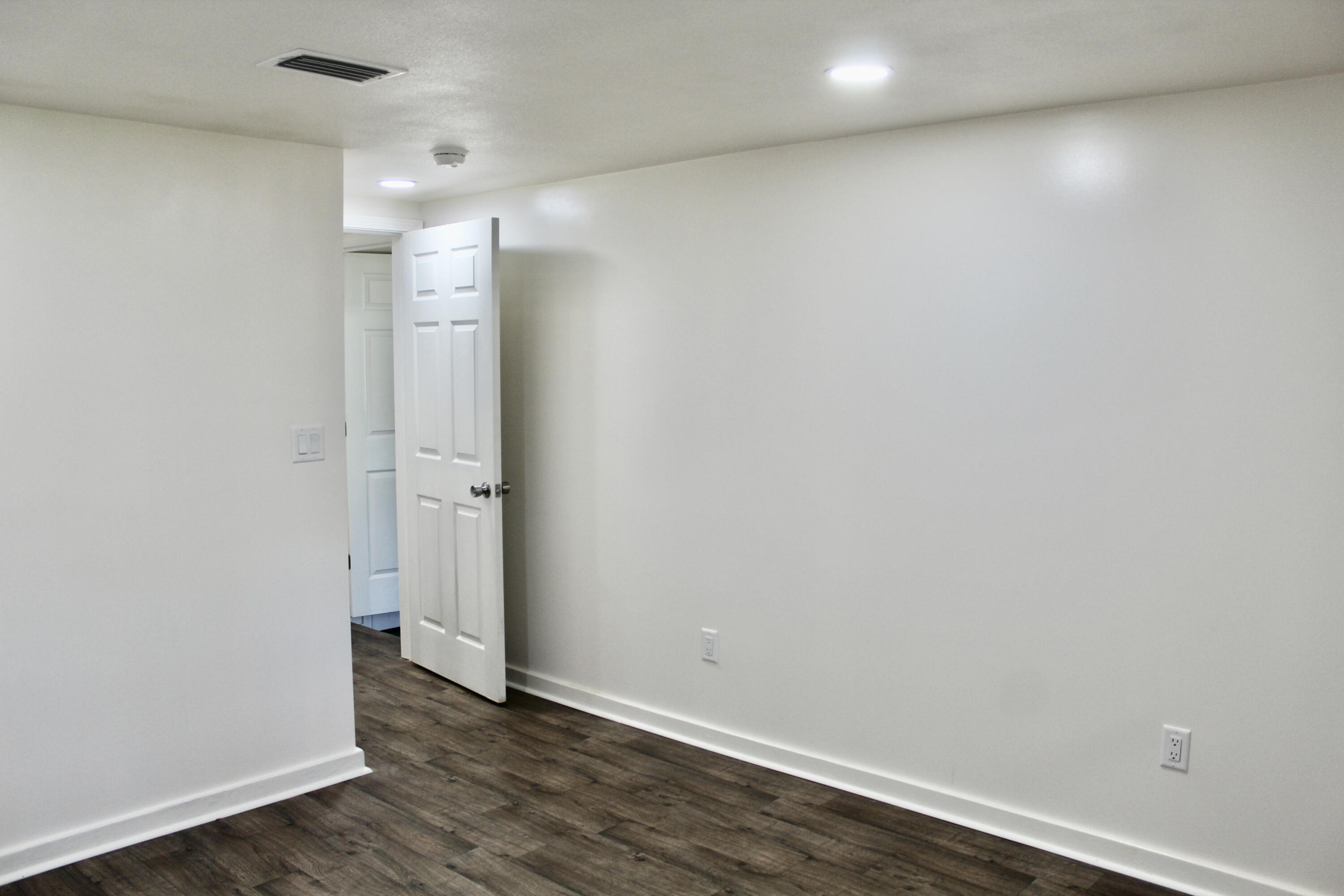 2833 Ponce De Leon Springs Road Ponce de Leon, FL 32455 - Photo 10 of 16 a view of an empty room with wooden floor
