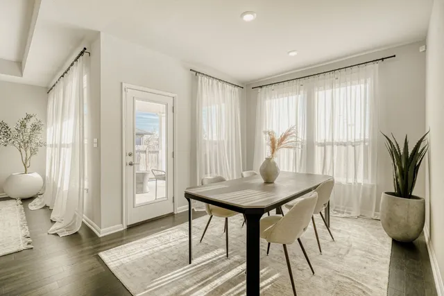 a view of a livingroom with furniture and a window