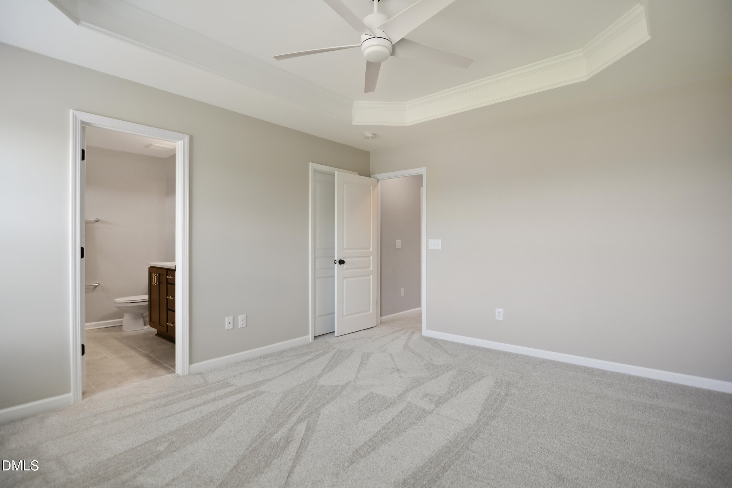 5916 Giddings Street Raleigh, NC 27616 - Photo 17 of 49 a view of a room with a stylish ceiling fan and entryway