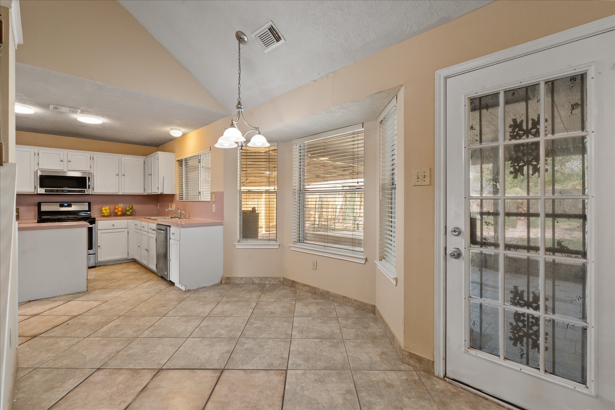 3708 Nutwood Lane Spring, TX 77389 - Photo 8 of 20 Cozy breakfast area conveniently located off the family room and open to the kitchen.