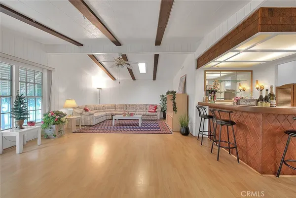 a view of a living room and dining room