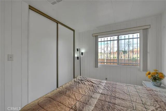 a view of a bedroom from a hallway