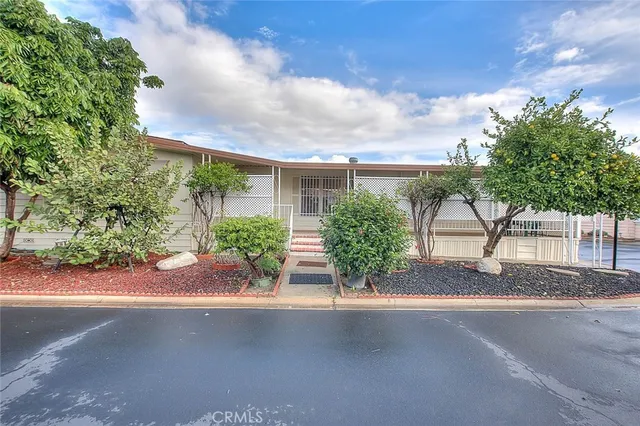 a view of a house with a street