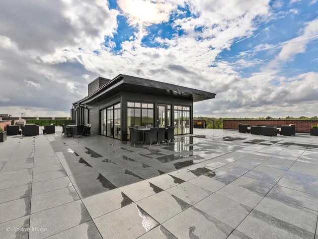 a view of a terrace with sitting area