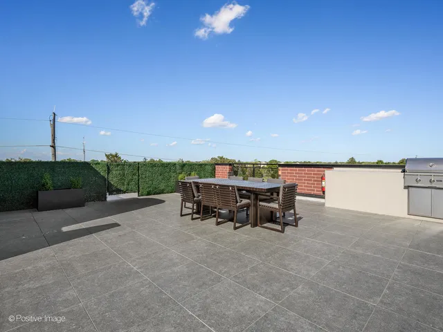 a view of a terrace with sitting area