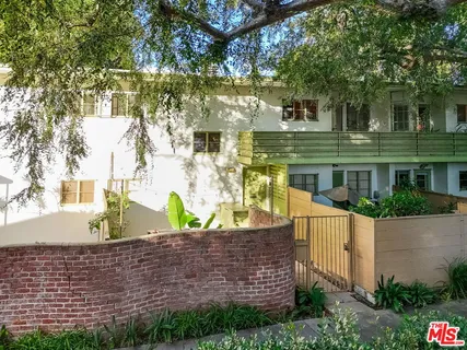 an aerial view of a city and mountain
