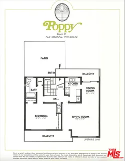 an aerial view of a houses with a yard