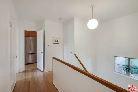 a room with furniture and a window