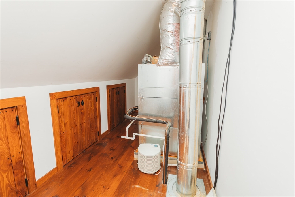 559 Tea Street Charlemont, MA 01339 - Photo 16 of 38 a bathroom with a sink and mirror with toilet