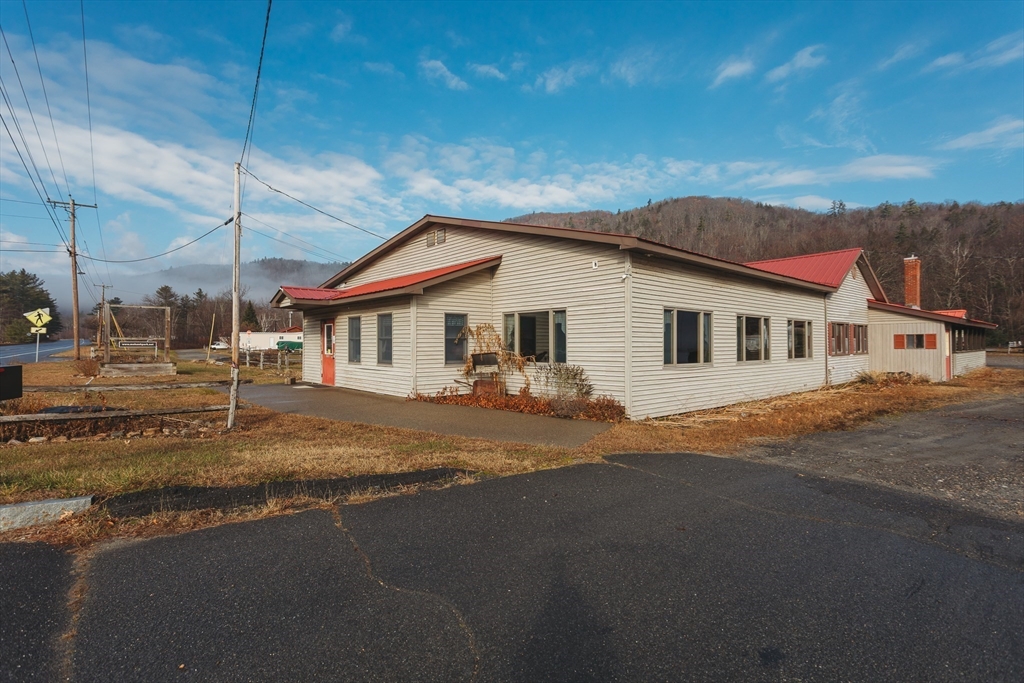 559 Tea Street Charlemont, MA 01339 - Photo 19 of 38 a view of a house with a patio