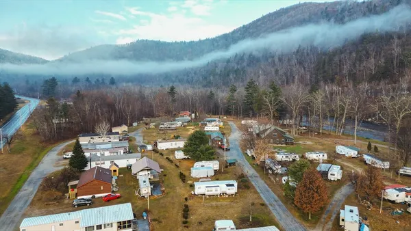 a view of a gym with seating area