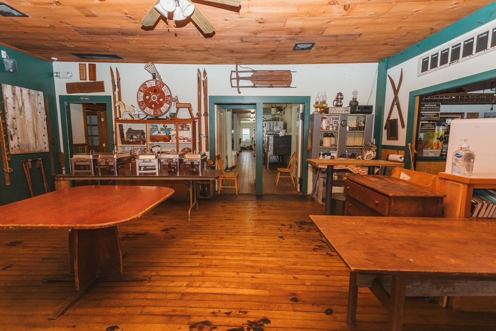 559 Tea Street Charlemont, MA 01339 - Photo 26 of 38 a room with lots of tables and chairs