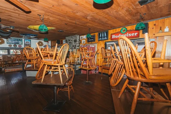 a room with wooden cabinets and gym equipment