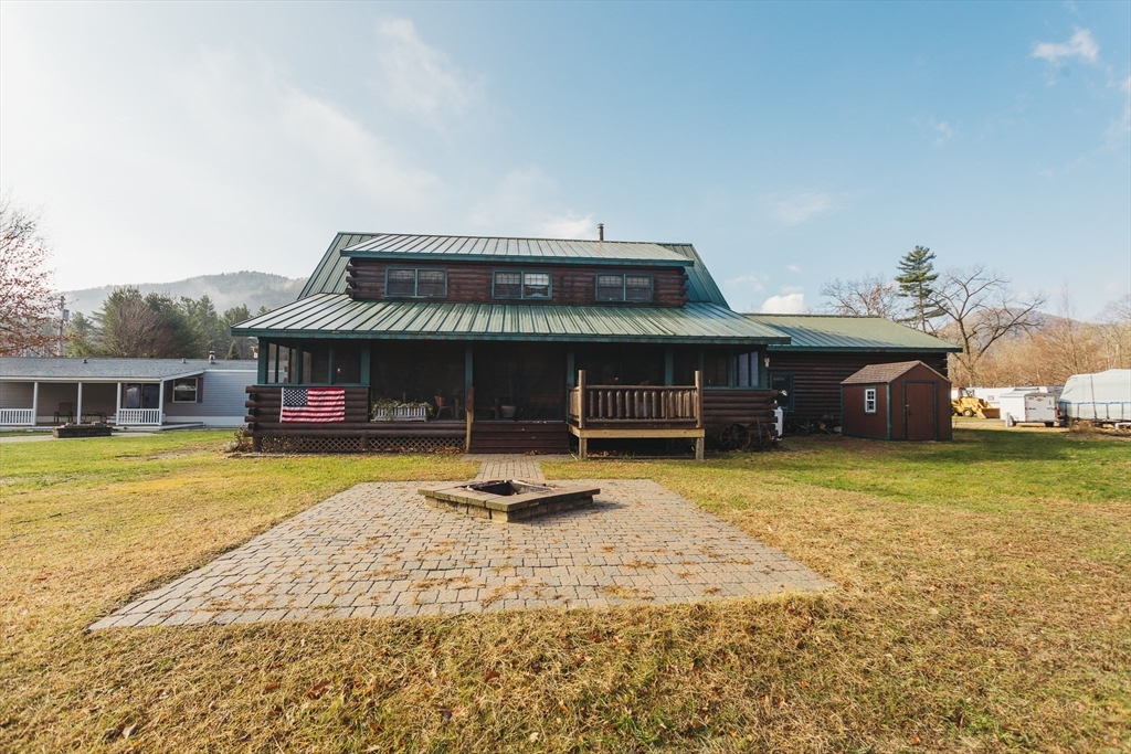 559 Tea Street Charlemont, MA 01339 - Photo 3 of 38 a view of a house with swimming pool and a yard