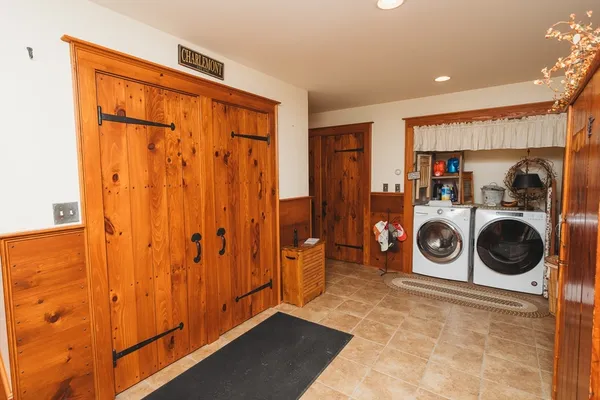 a utility room with dryer and washer