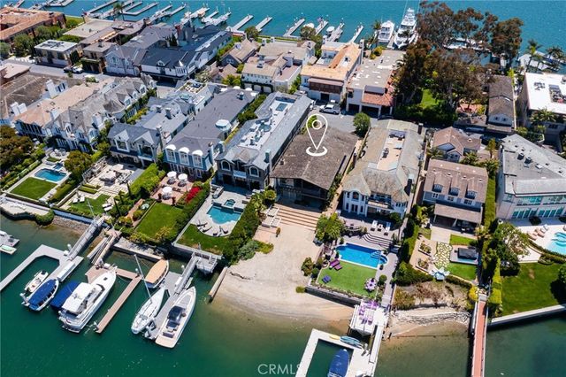 an aerial view of a city with ocean view