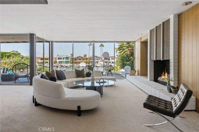 a kitchen with stainless steel appliances granite countertop sink stove and refrigerator